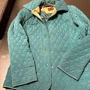 It’s green colored jacket and it’s in perfect condition